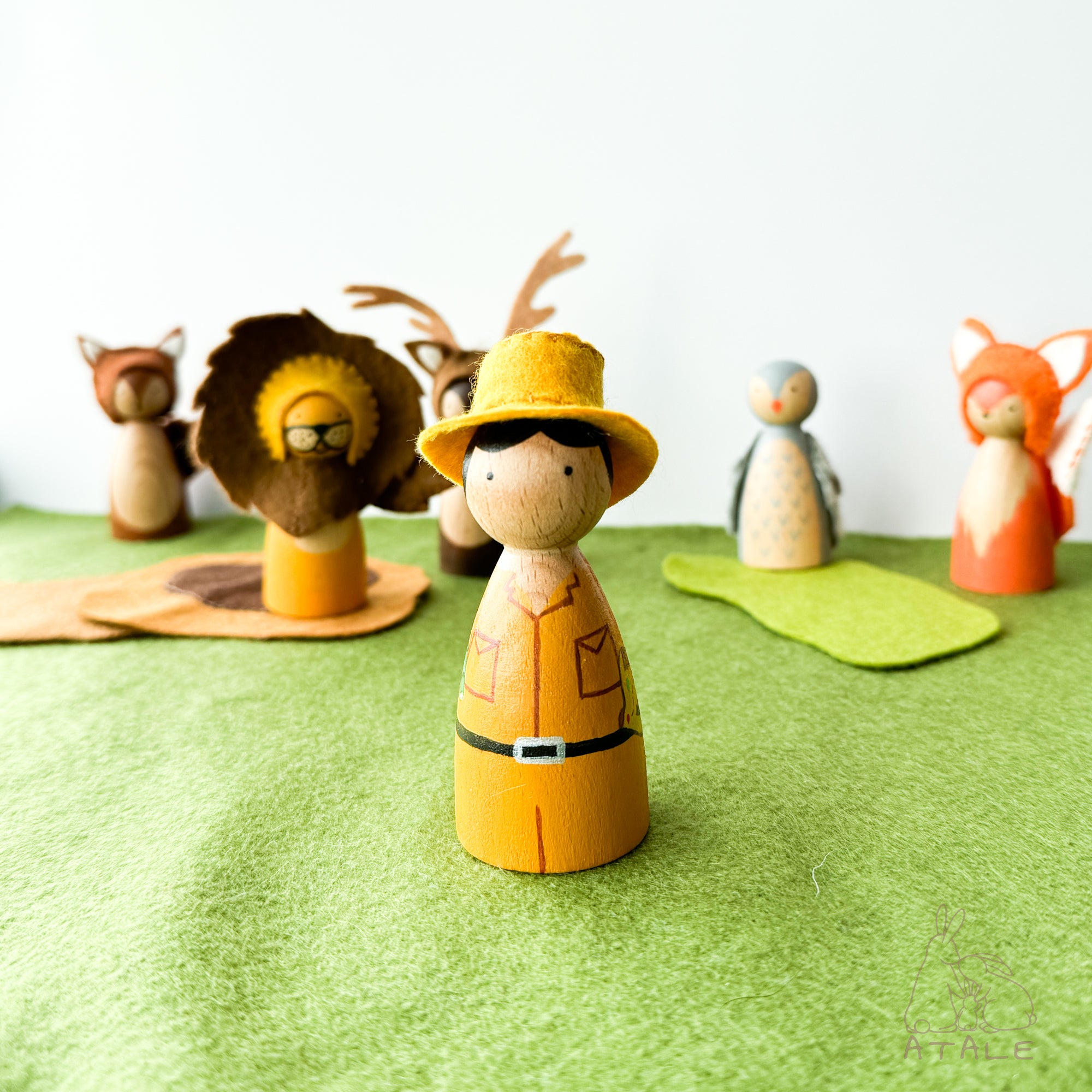 Wooden safari ranger peg doll with felt hat